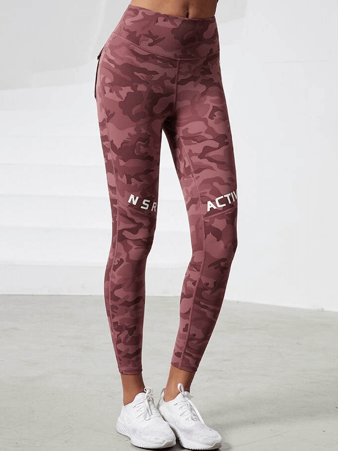Camouflage high waist seamless leggings with pockets, ideal for yoga, running, and dancing, featuring breathable and quick-dry fabric.